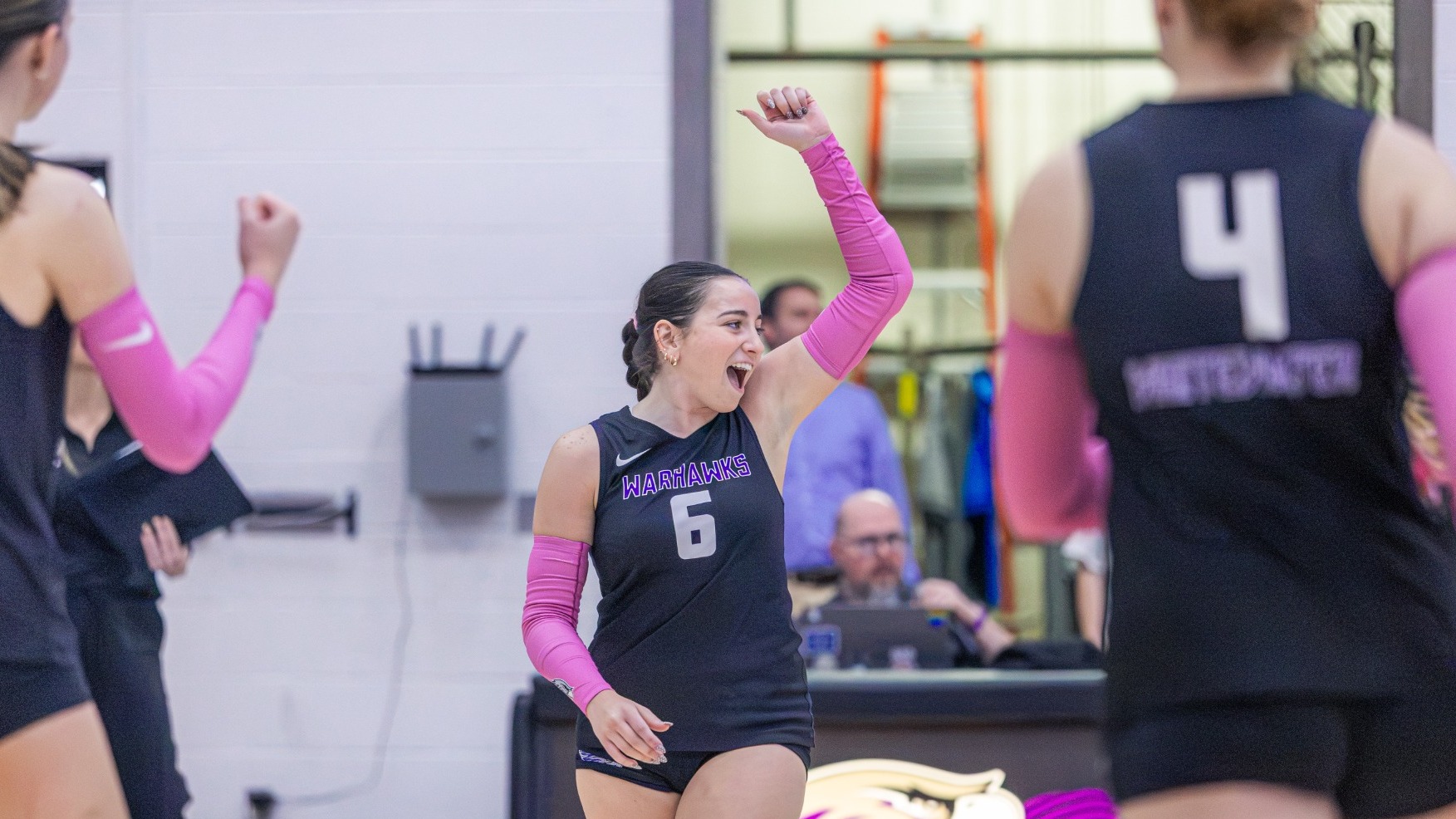 Natalie Lawton celebrates after a Warhawk point