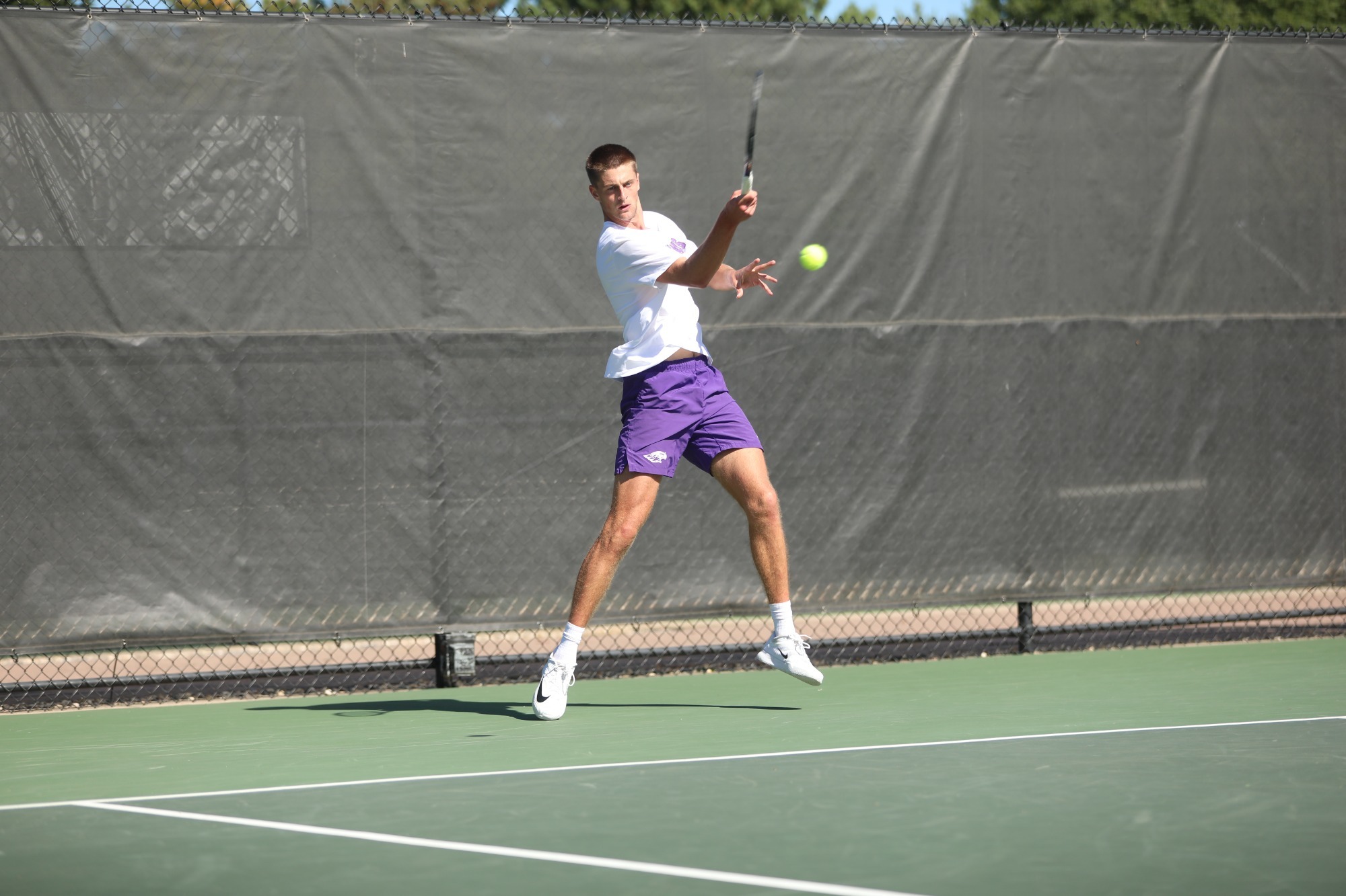 Billson Takes shot tennis