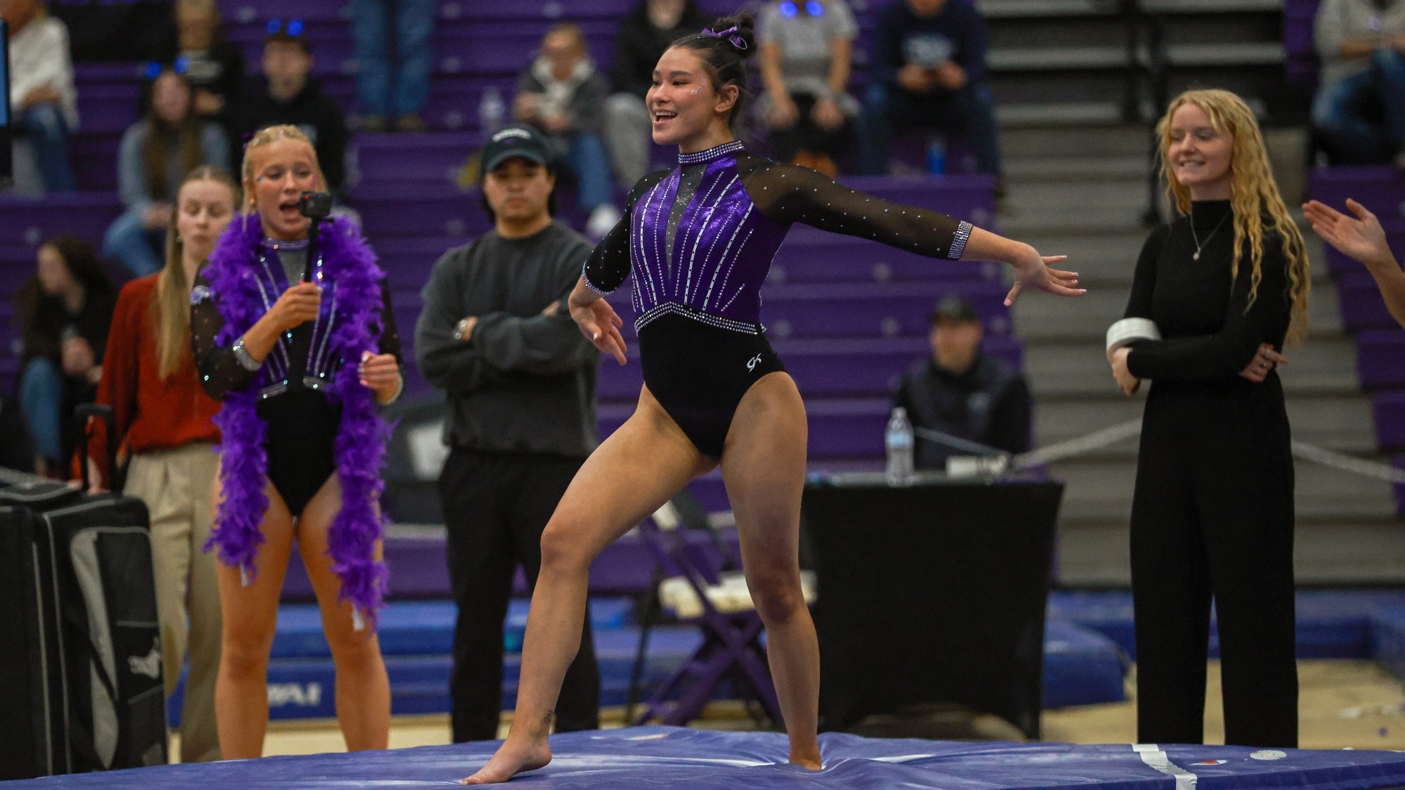 Paige Magel competes on the floor against UW-Stout