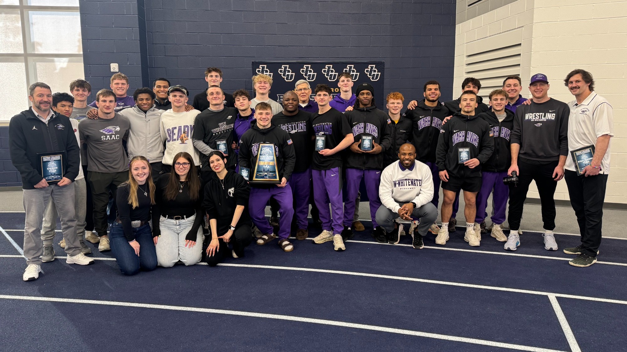 Wrestling Team Photowith Regional Championship Trophy