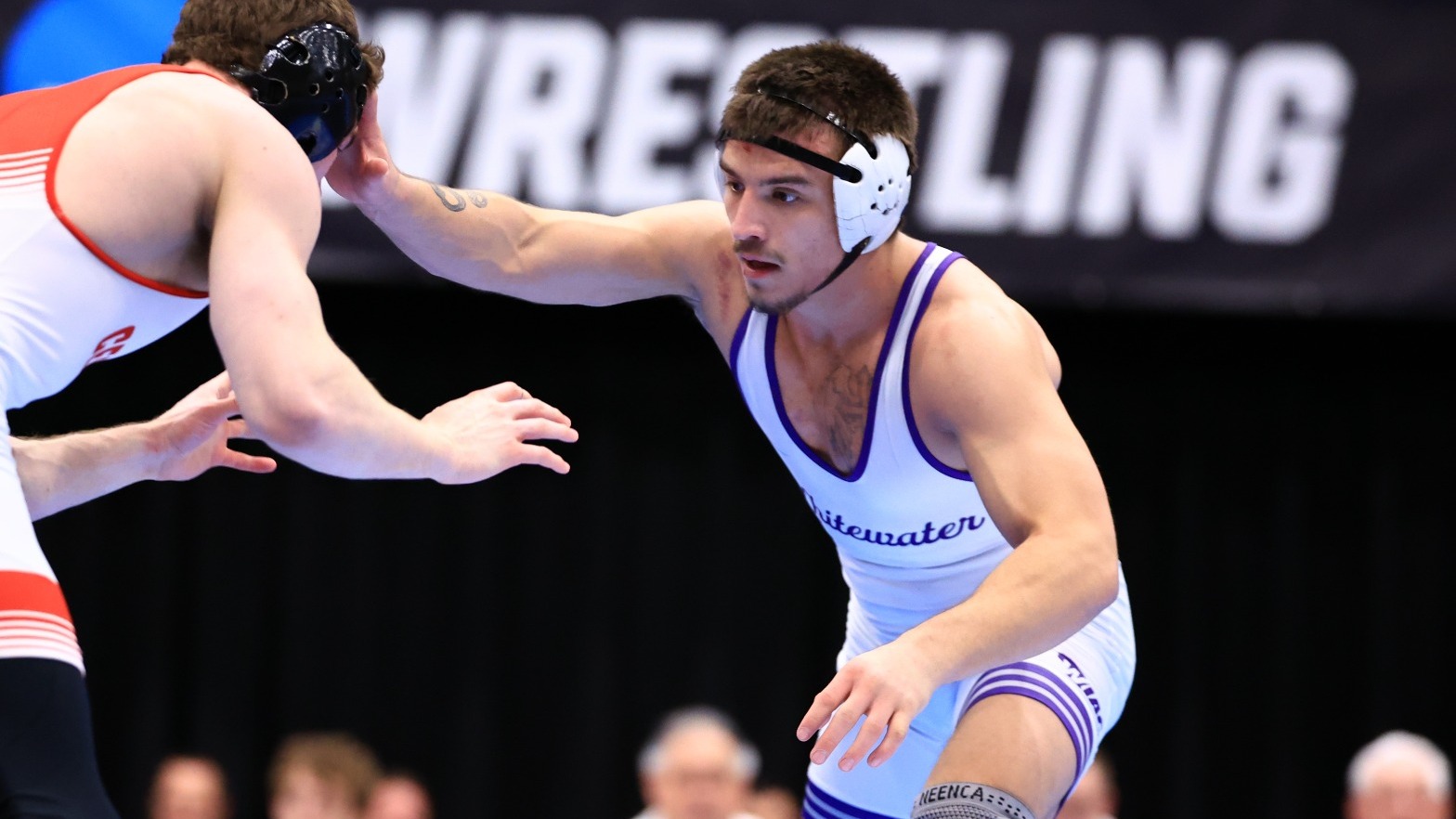 Dominik Mallinder wrestles in the national championship bout