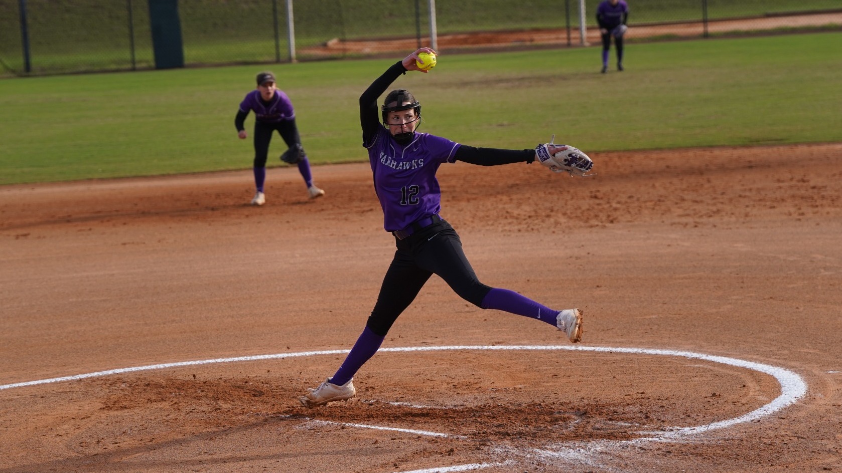 Brooke Hock pitching during one of the Warhawks' games in Florida