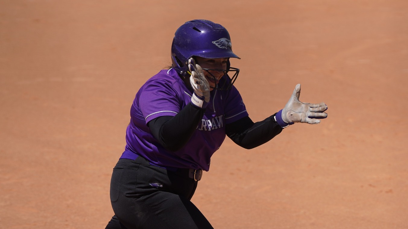 Amanda Turofsky celebrates after drawing a walk