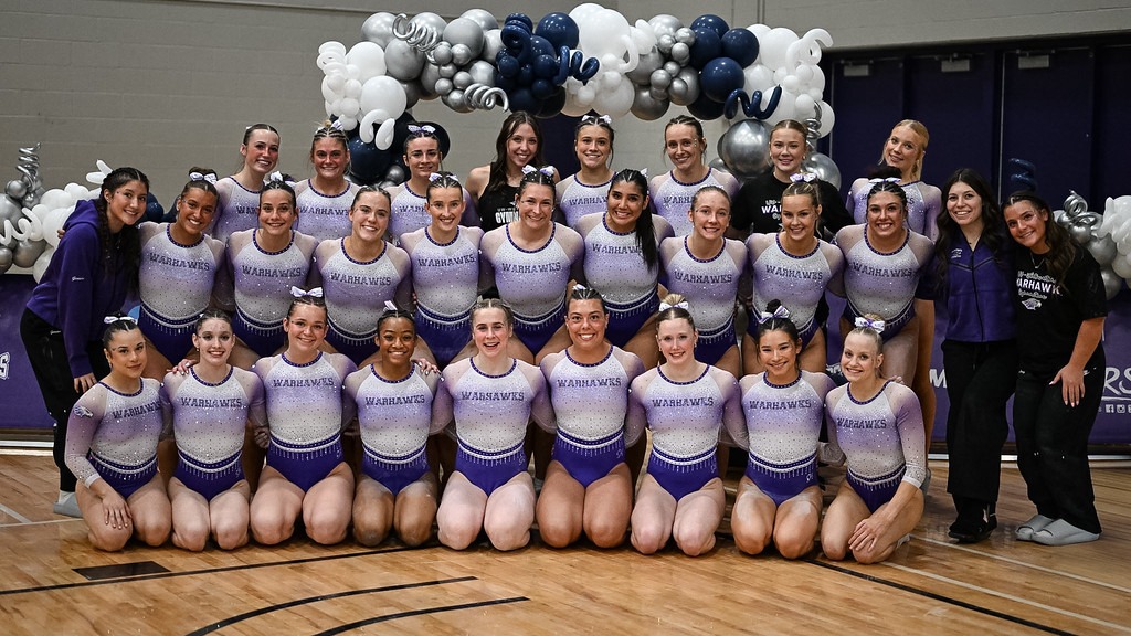 Warhawks pose as a team following the WIAC Championship
