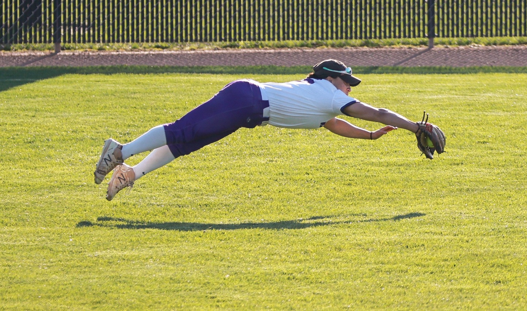 Liv Ybarra lays out to catch a liner in right field