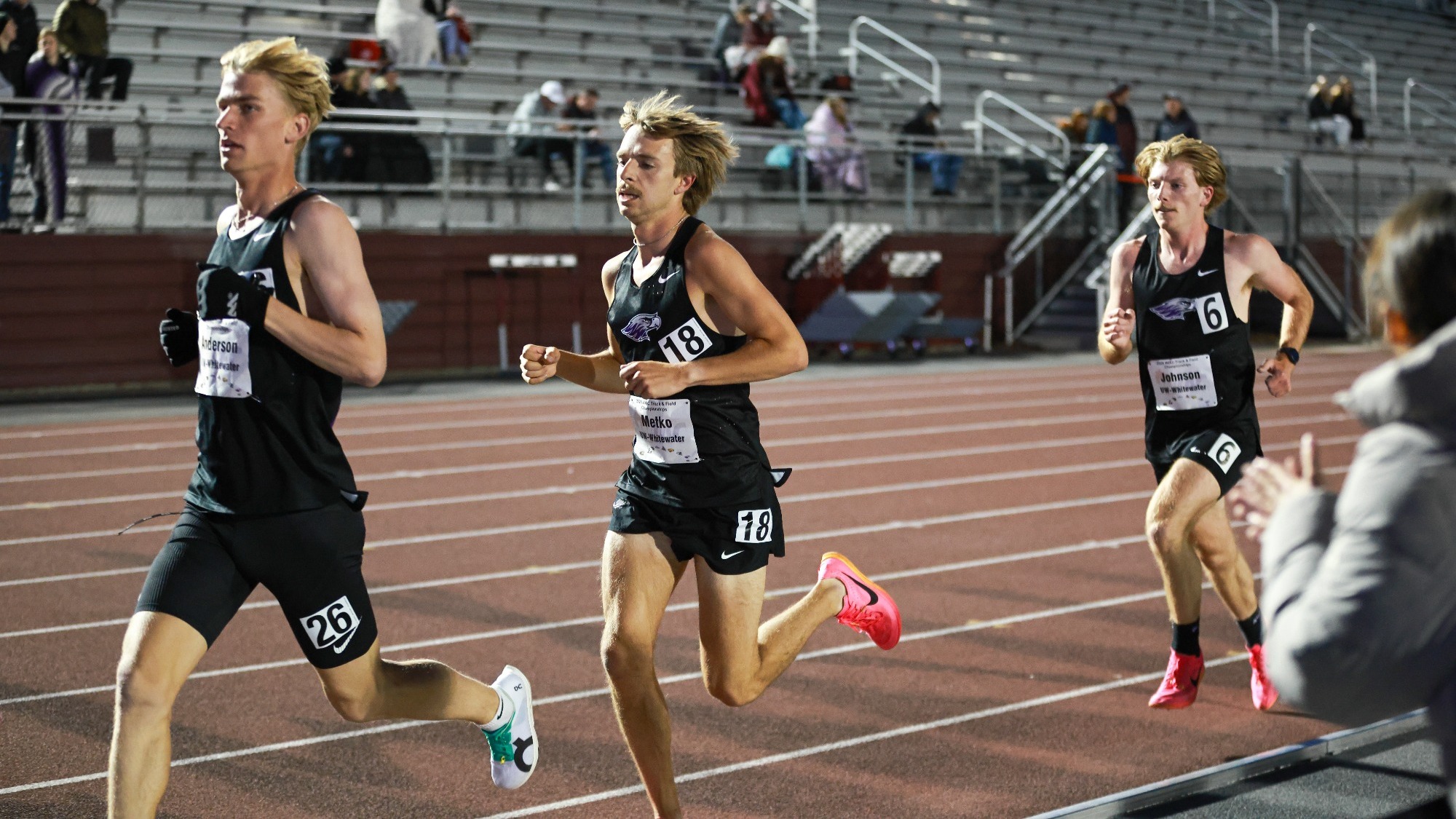Dan Anderson, Alex Metko and Tucker Johnson run in the 10,000 at the WIAC Outdoor Championship