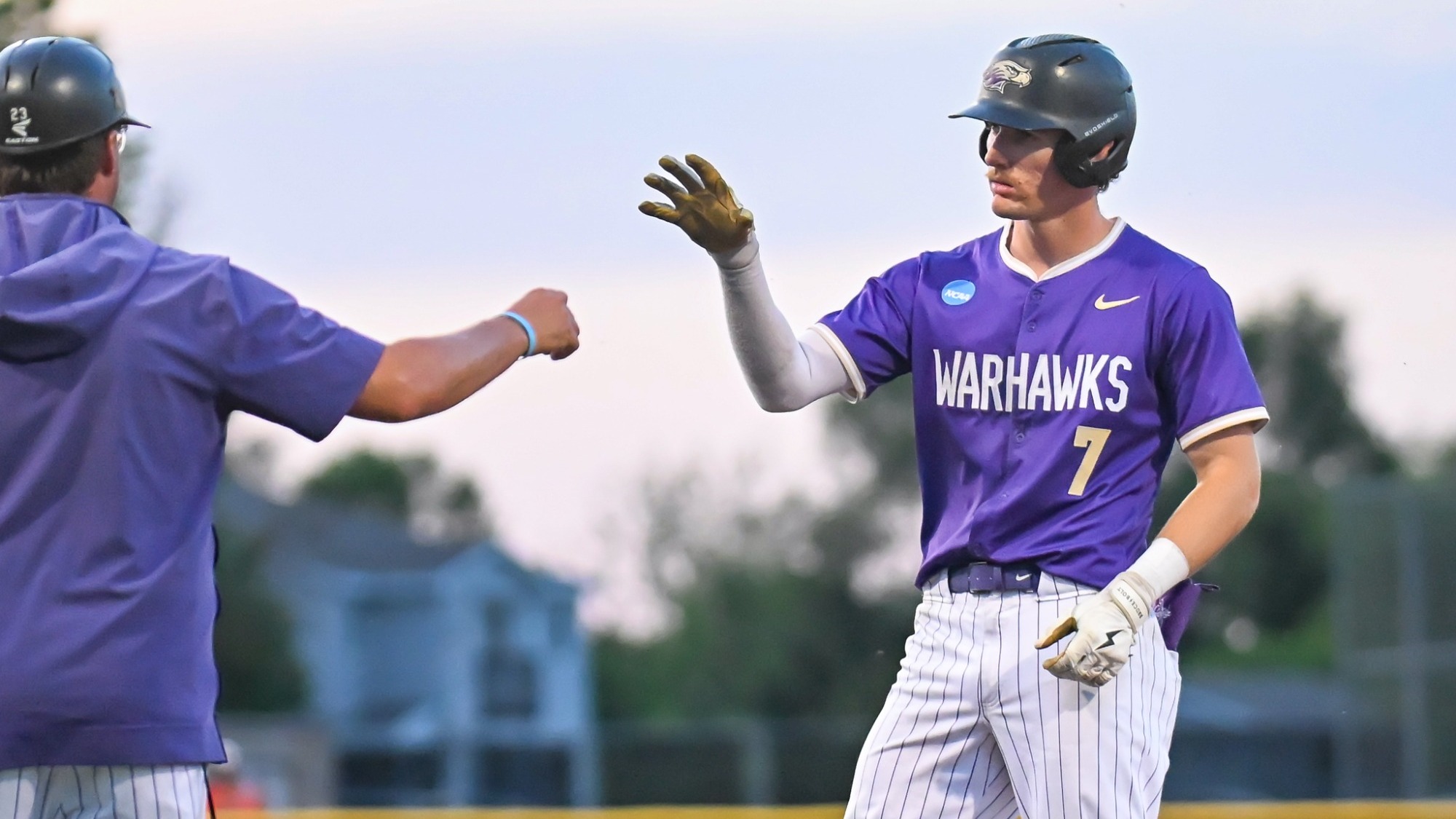 Thies at First celebrating with Coach Bayreuther