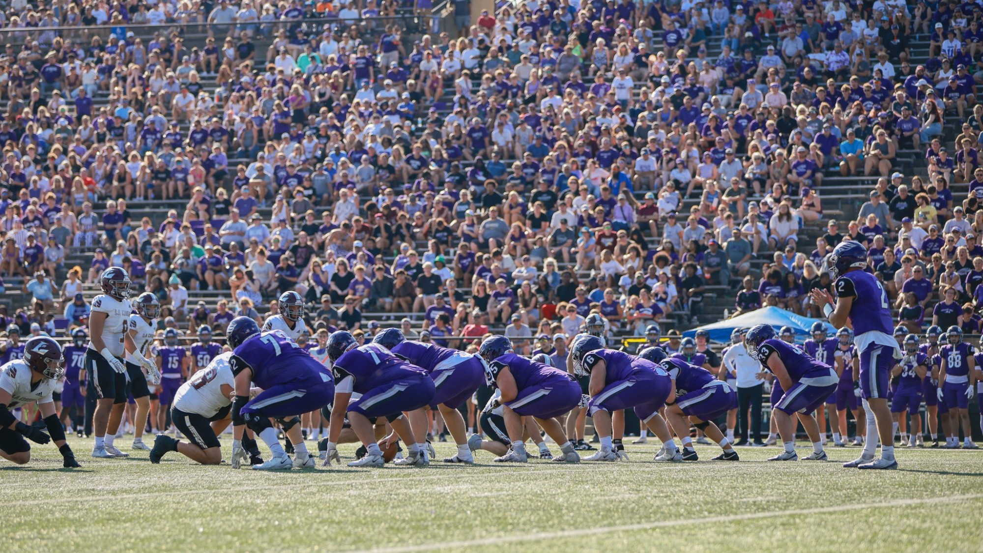 Offensive line sets during the UWL game in 2025