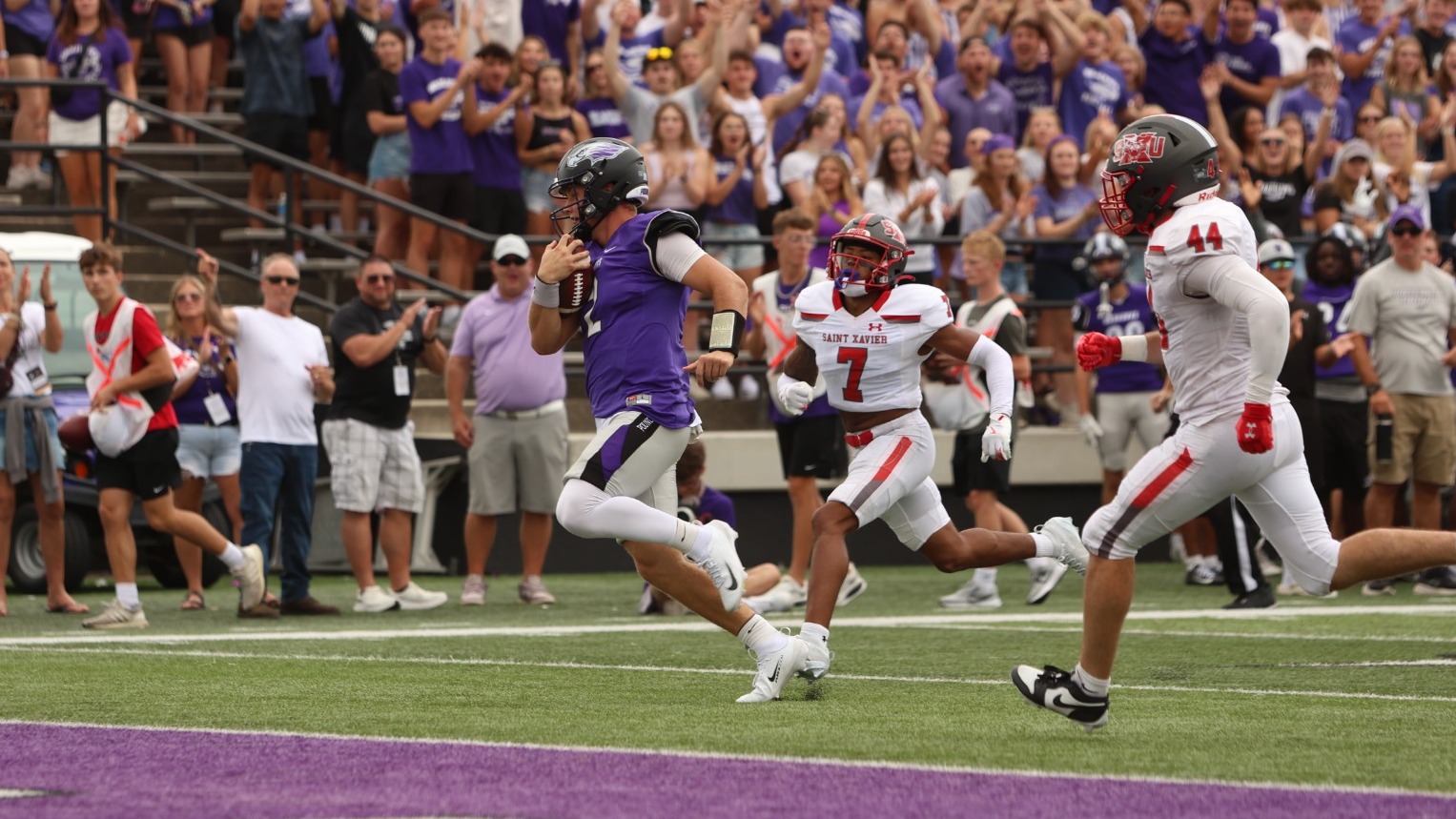 Justin Klinkner runs away from the defense for a touchdown against SXU