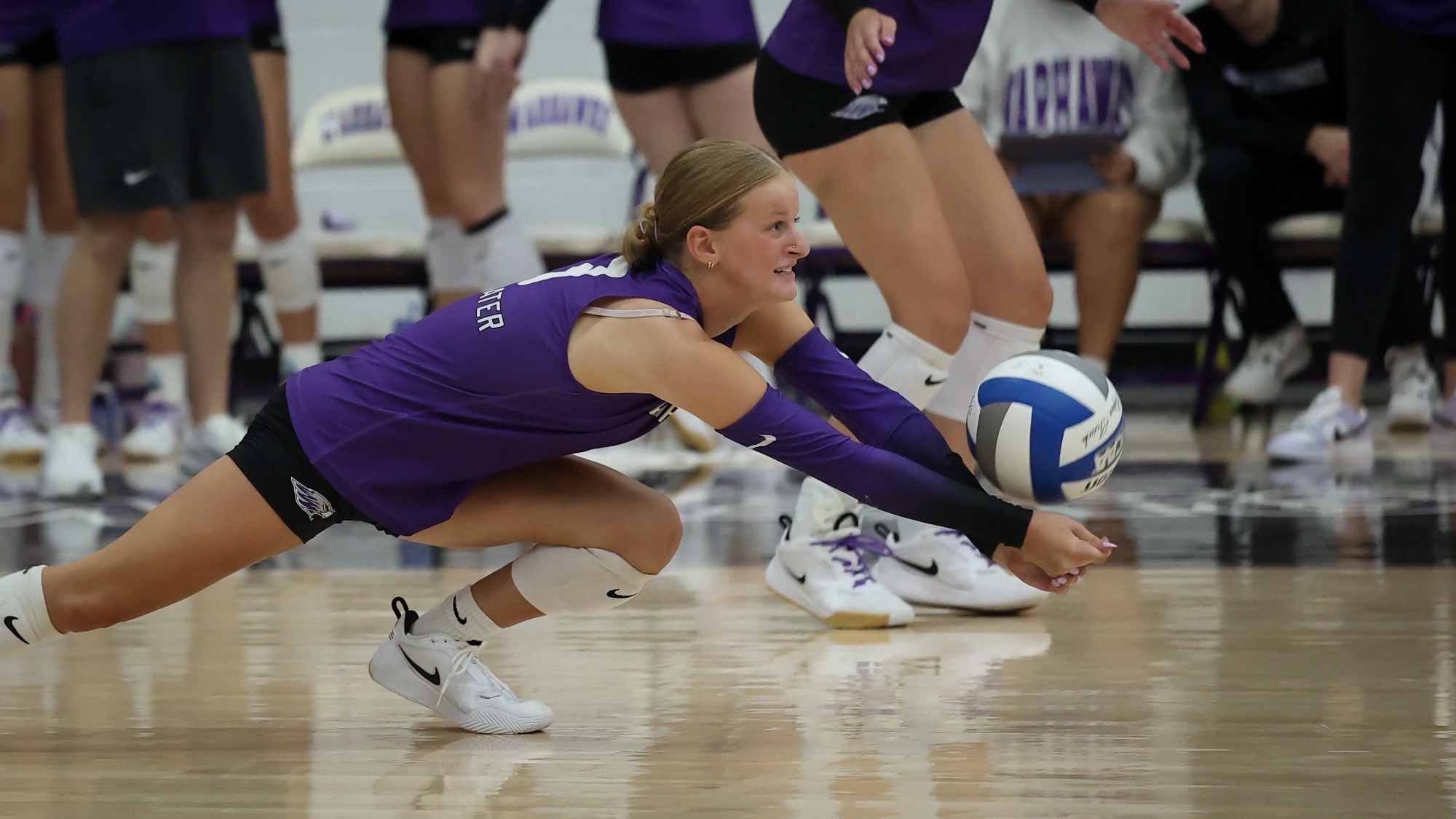 Addie Bruns digs a ball against Concordia Wisconsin