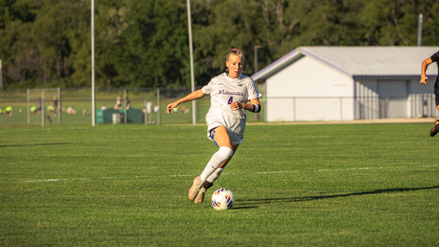 Leah Dehne Working ball up the field