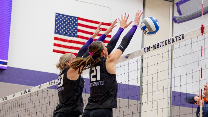 Abbie Dix and Aubrie Krzus block