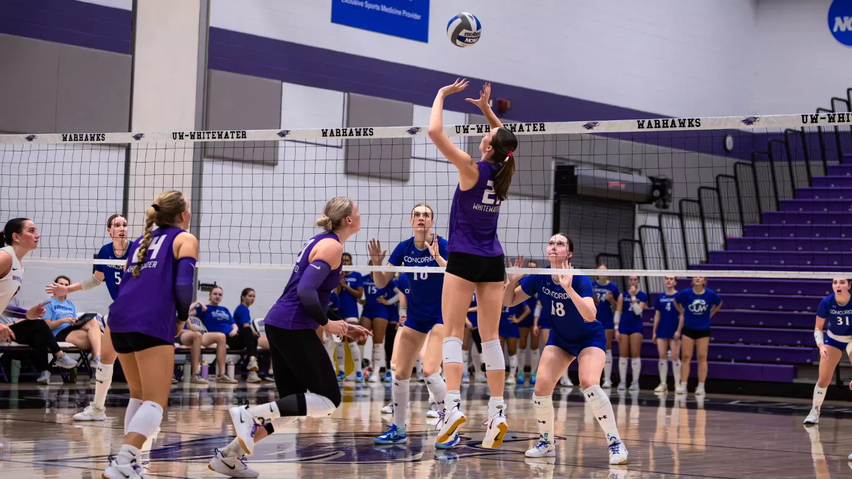 Aubrie Krzus sets up a teammate in a scrimmage against Carroll