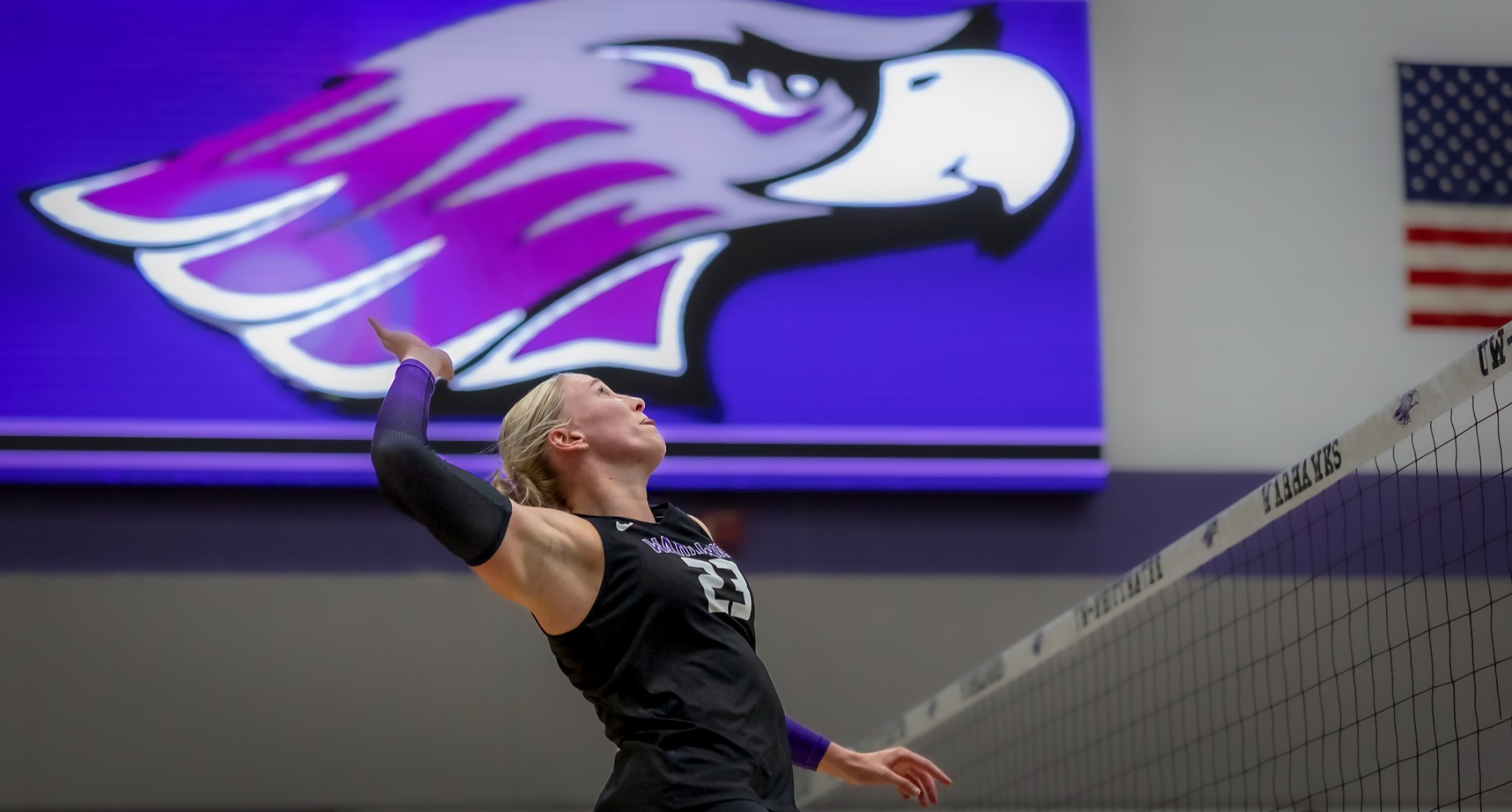 Abbie Dix rises up to attack a ball