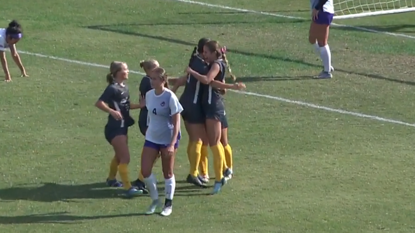 2025 SOC Kennedy Hill Lauren Hill embrace after goal