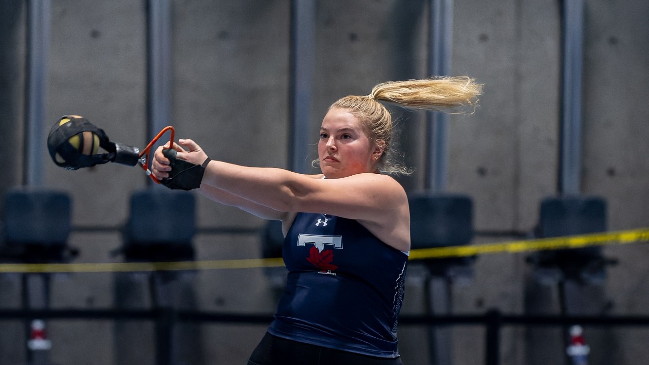 Pheobe Prince-Roberts competing in women's weight throw 