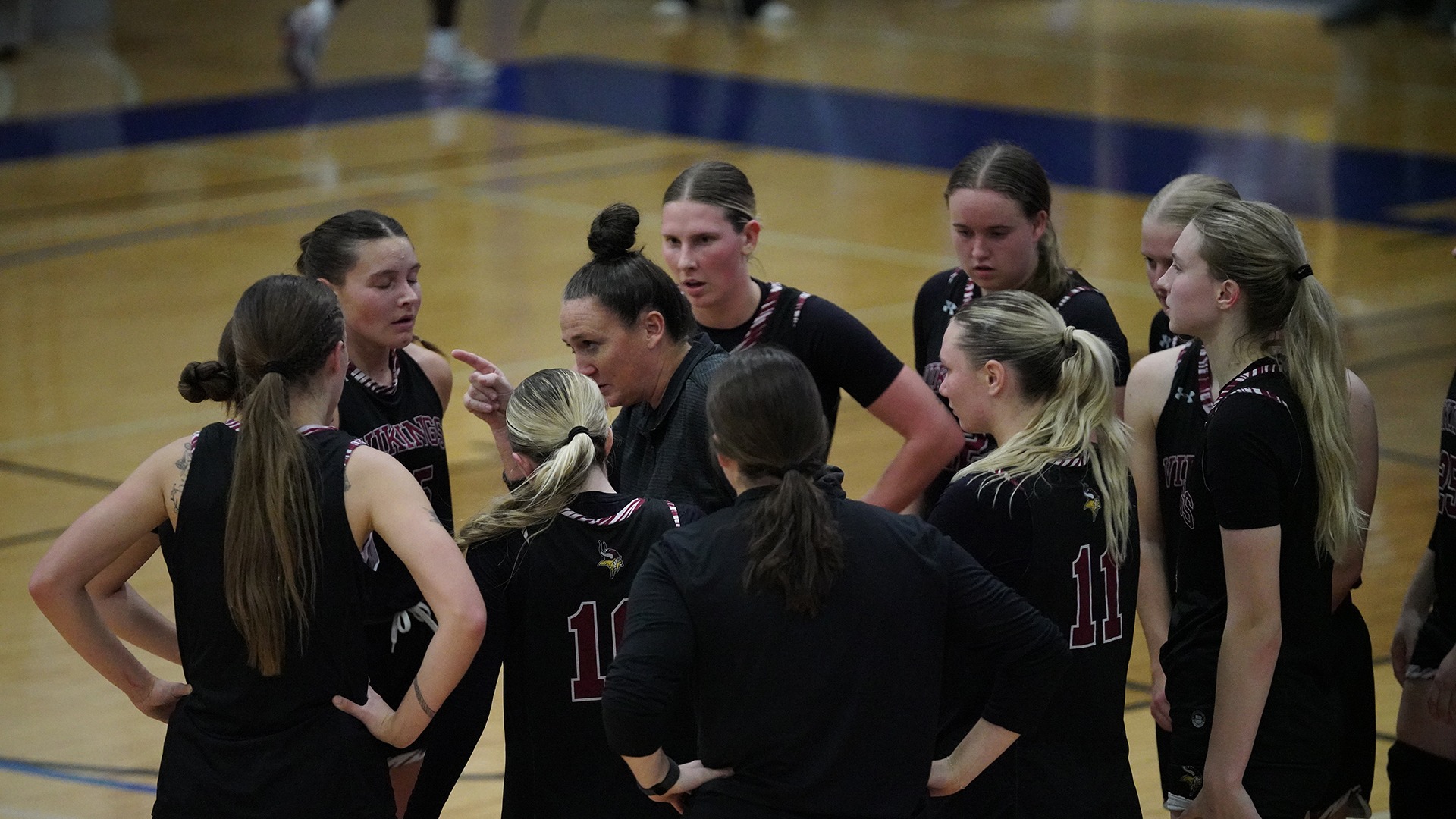 Coach Johnson in the huddle