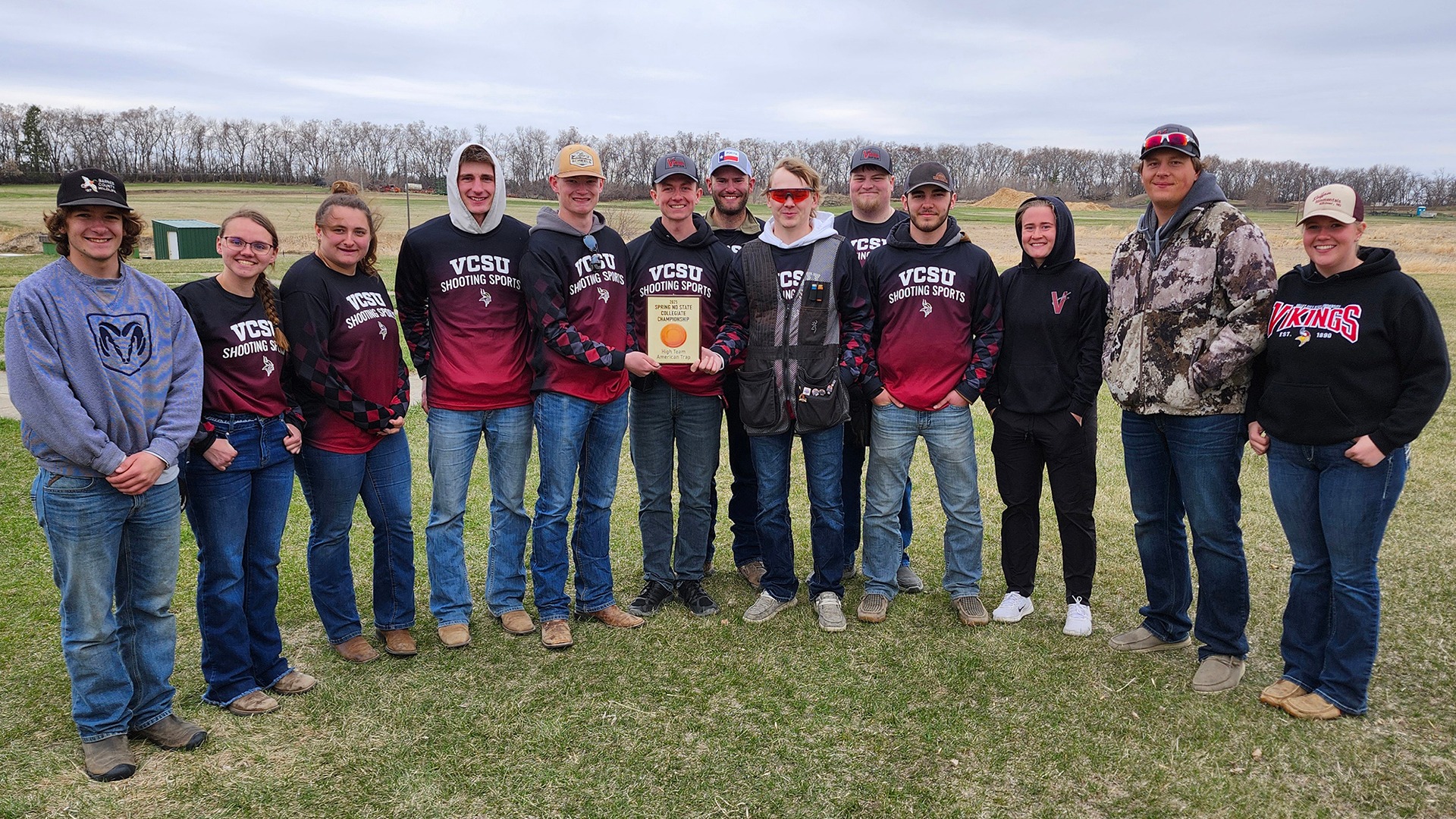 The 2025 Trap Shooting team pictured with the state championship trophy.