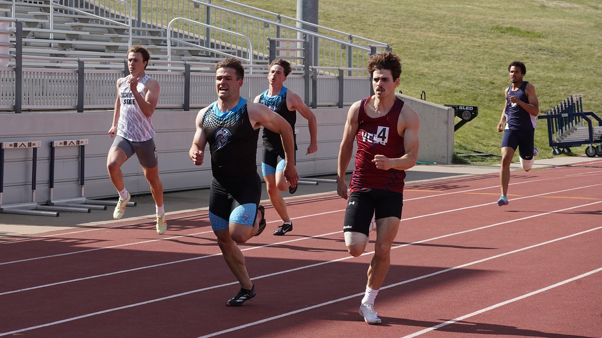 Jordan Mount runs 400 meter race.
