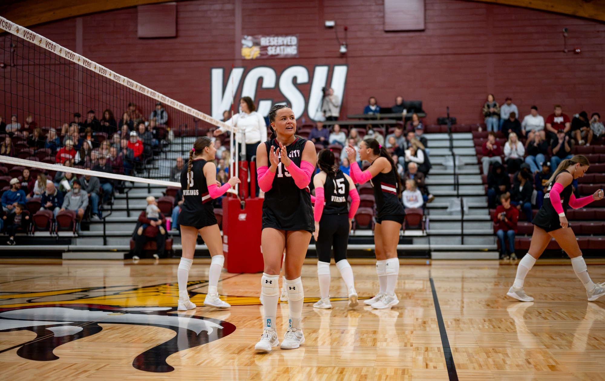 Pre-game story- Carroll and Rocky Mountain Games, Gracie Schumacher claps after getting a challenge overturned. 