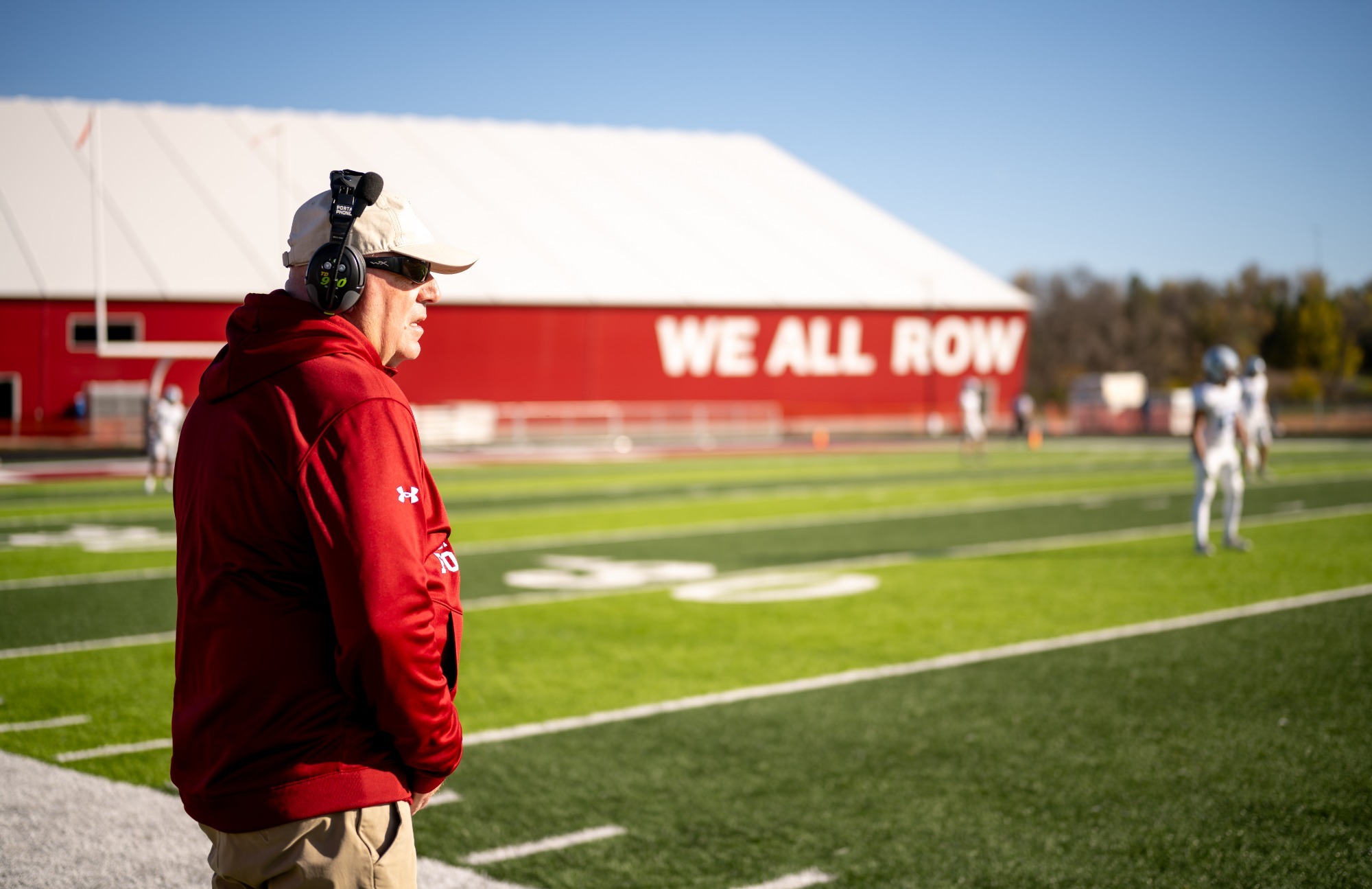 Pre-game FB Story- vs. Dickinson State 2026, Coach McCulloch watches the game unfold in front of the new Viking athletics facility.