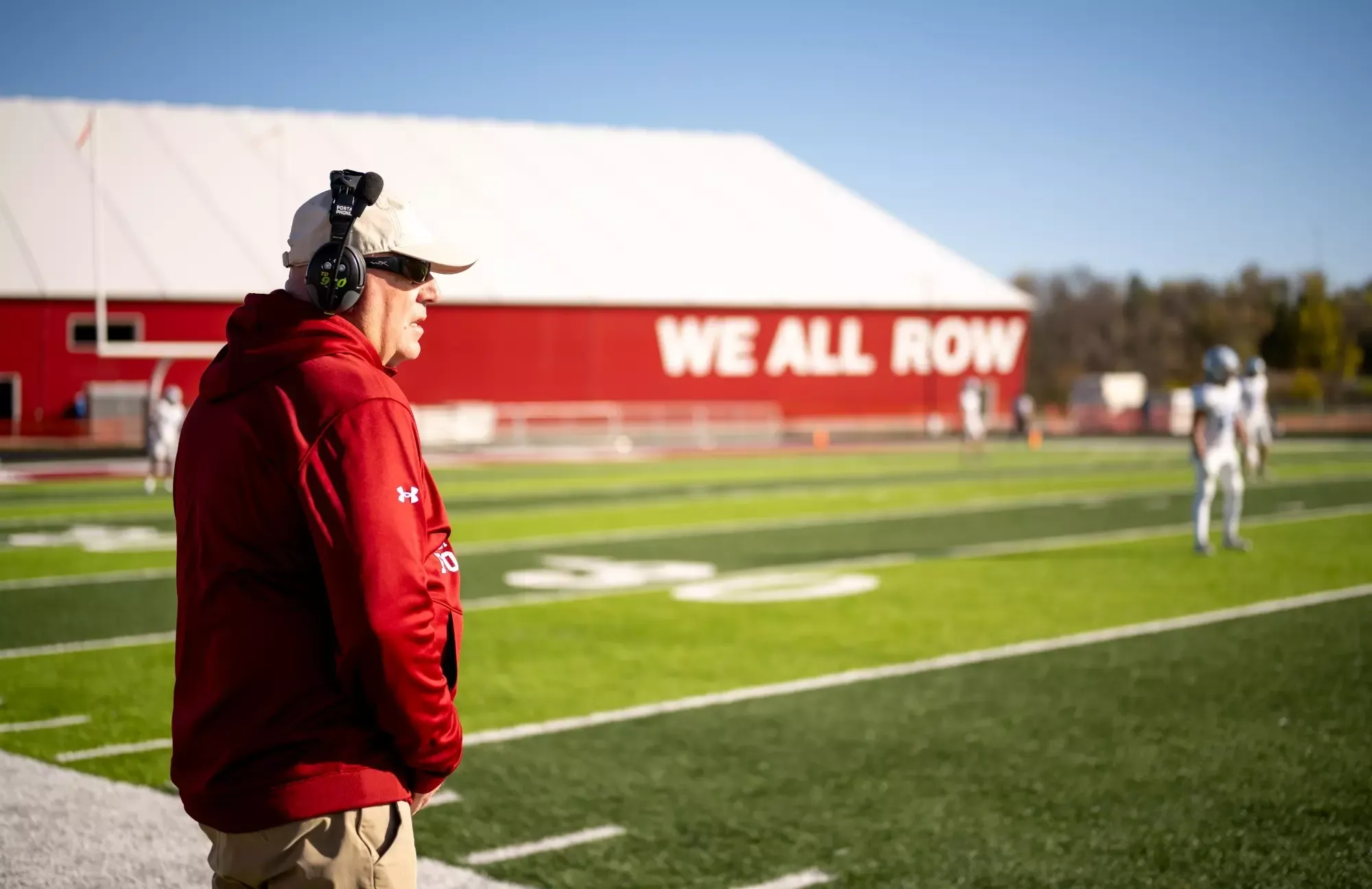 Pre-game FB Story- vs. Dickinson State 2026, Coach McCulloch watches the game unfold in front of the new Viking athletics facility.