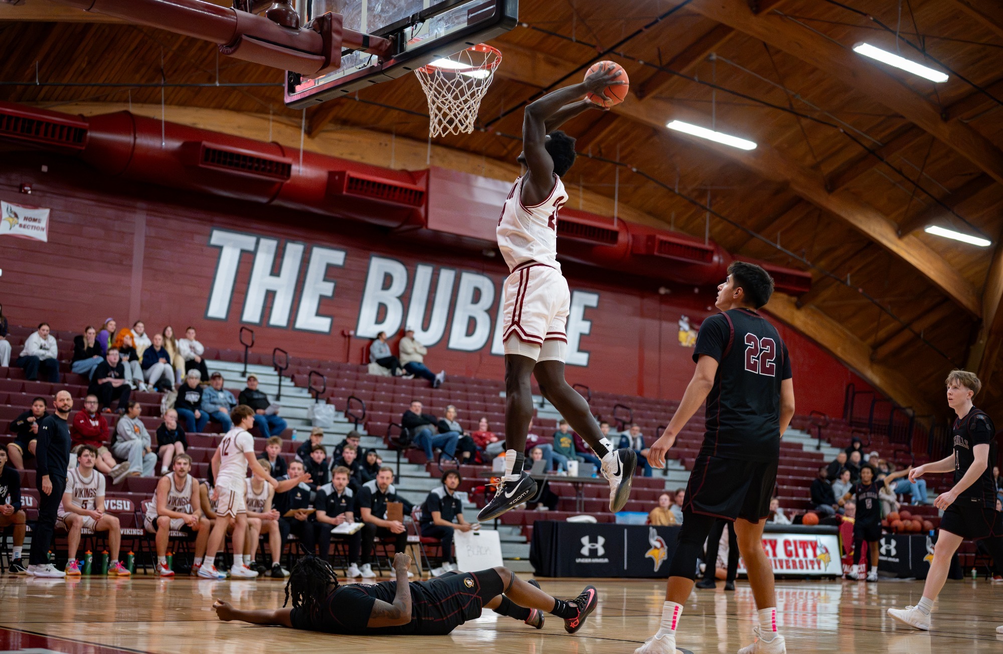 Post-game story- MBB vs. Oak Hills- Seydou Tamboura goes up for the dunk against Oak Hills Christian College.
