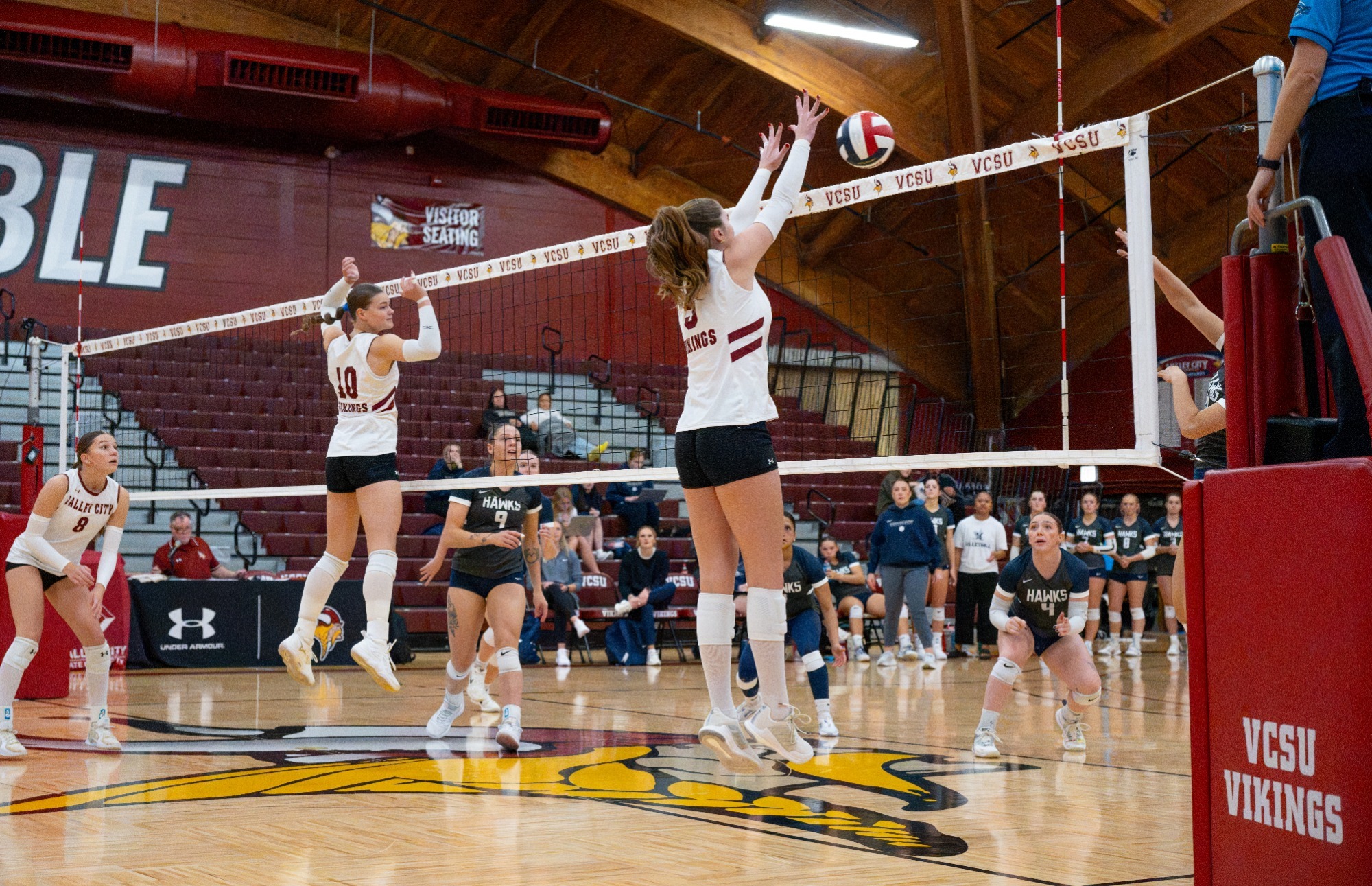Post-Game Story- Win over DSU 2026, Ellie Lucas goes up for a block against Dickinson State.