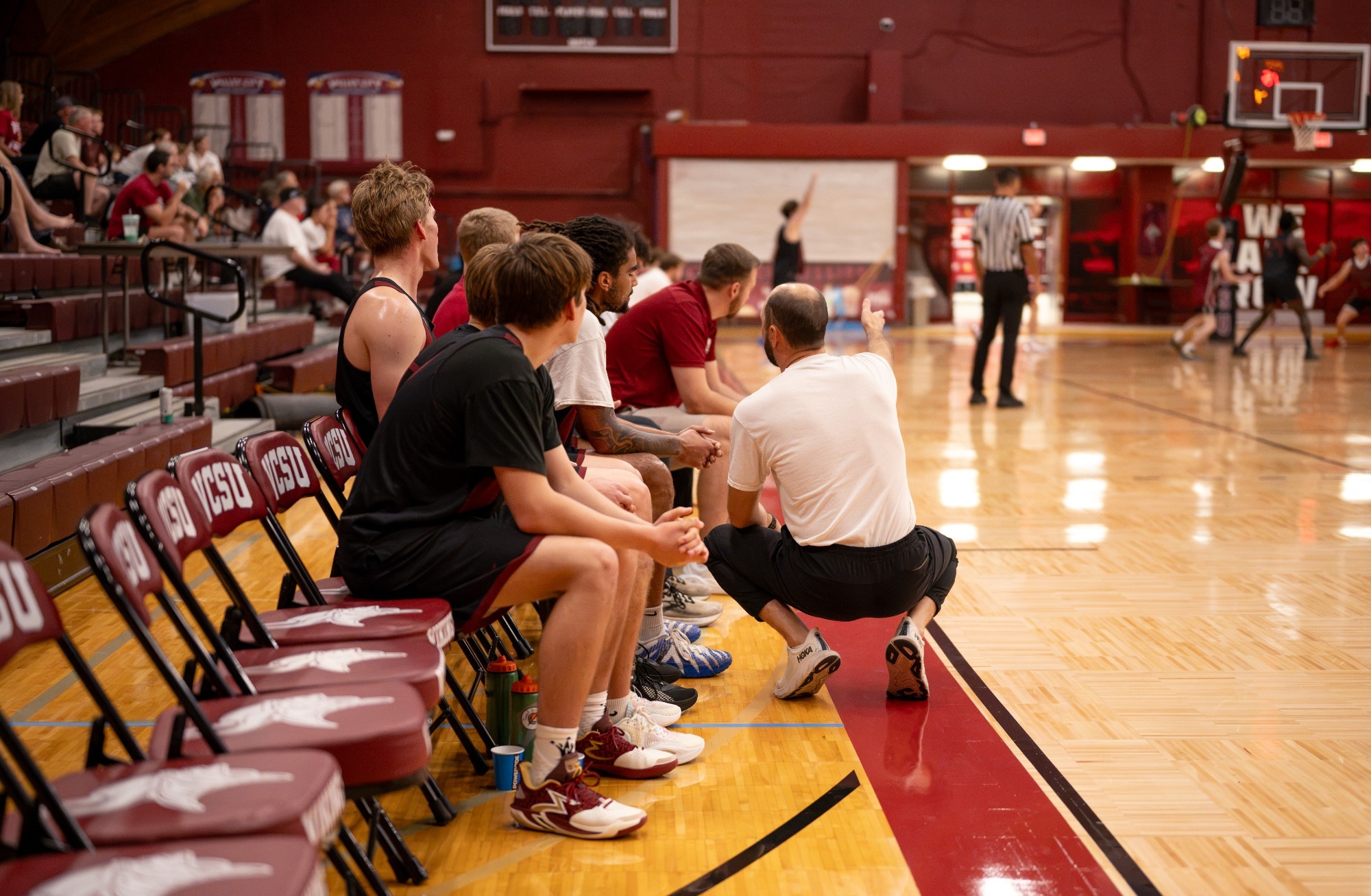 Post-game story- vs. Hastings 2026-27, Coach Ryan Montgomery talks his bench during the Cardinal vs. Black scrimmage.