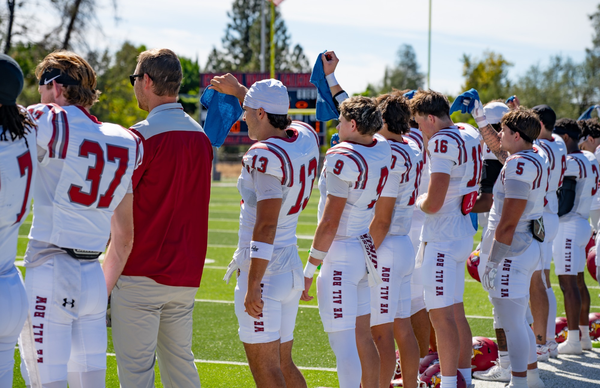 Pre-game story- FB vs. Mayville 2026, VCSU Football holds towels to honor Mayville's injured quarterback prior to their game versus Simpson. 