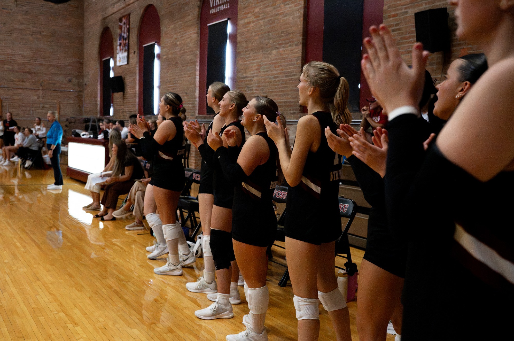 Viking VB- The bench cheers during VCSU rally at Graichen Gymnasium. 