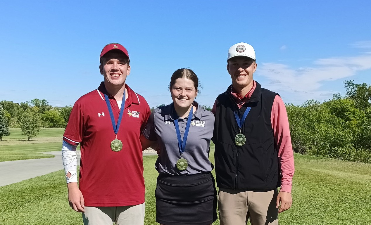 Blue Hawk Fall Invitational Winners- The Viking men and women golfers receive their awards for their success in their opening golf tournament.