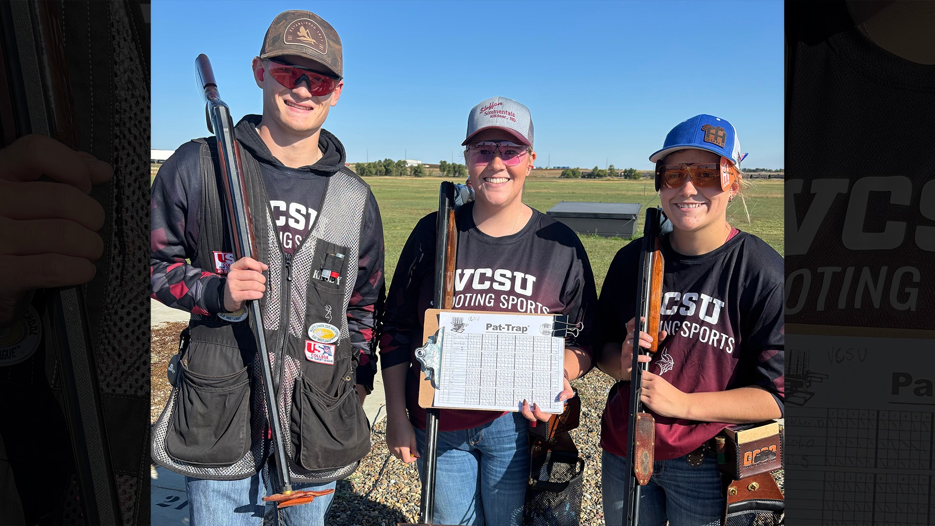 Shooting Sports- Dickinson State Weekend 2026, Team leaders group together for a picture displaying their awards. 