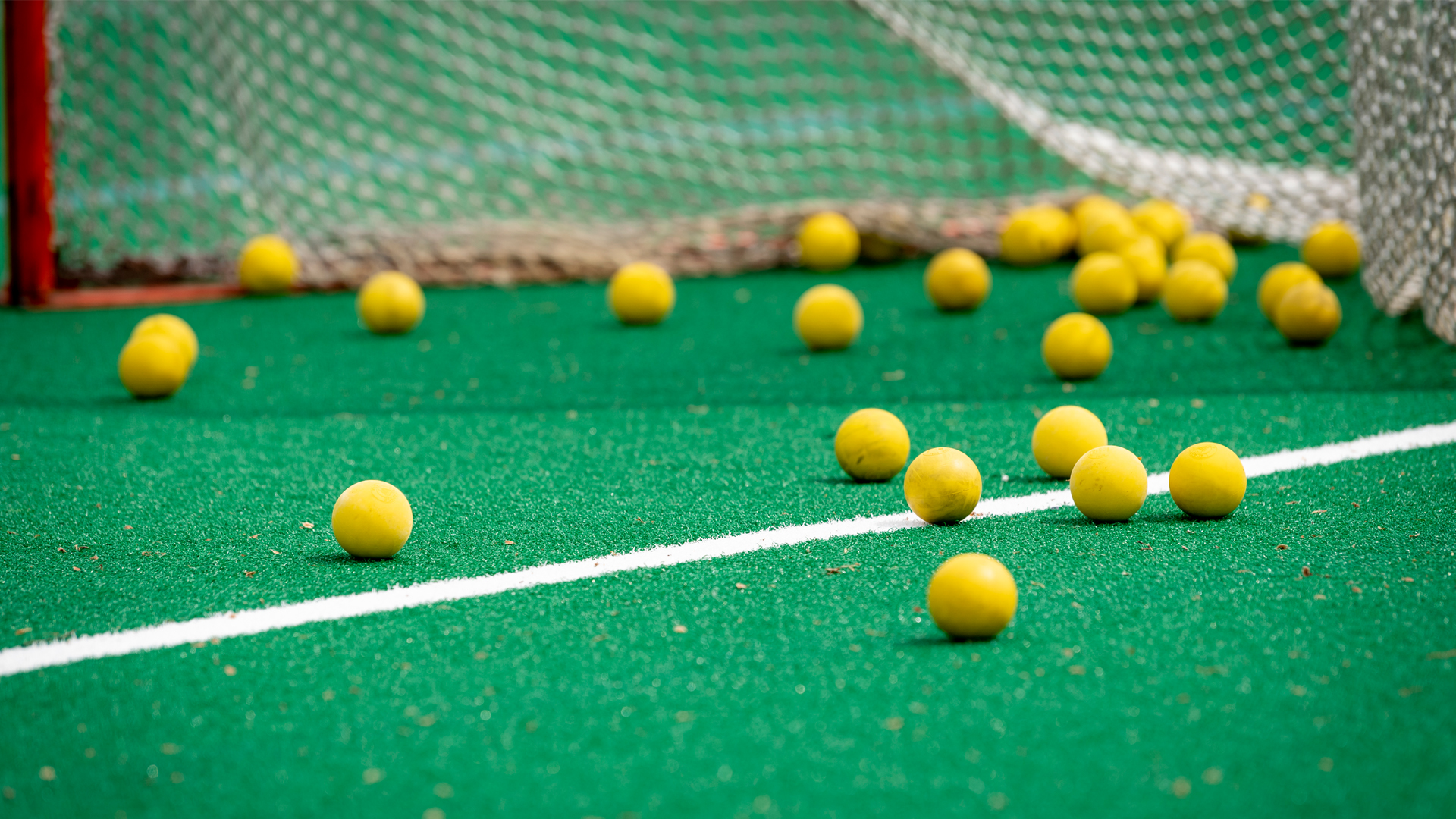 Lacrosse balls lay scattered on the Cary Street Field turf