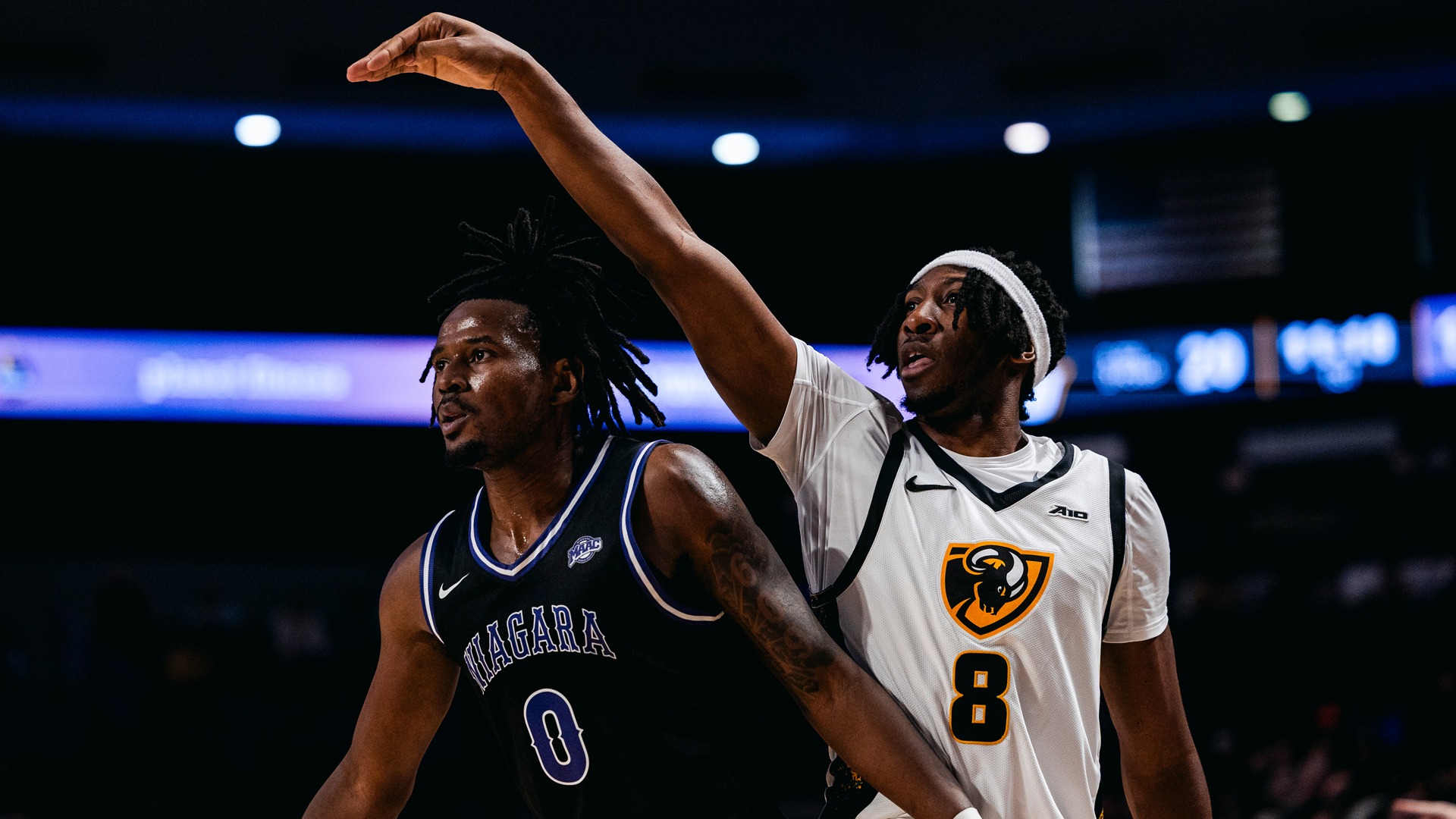 Michael Belle shoots over Niagara defender