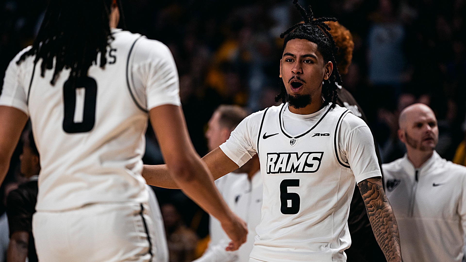 Terrence Hill and Brandon Jennings celebrate versus Bona