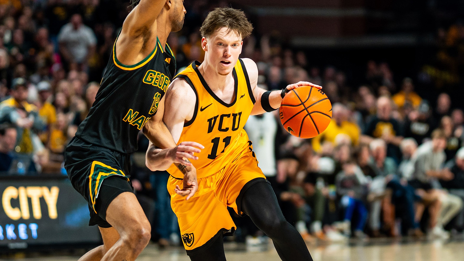 Max Shulga drives vs. George Mason