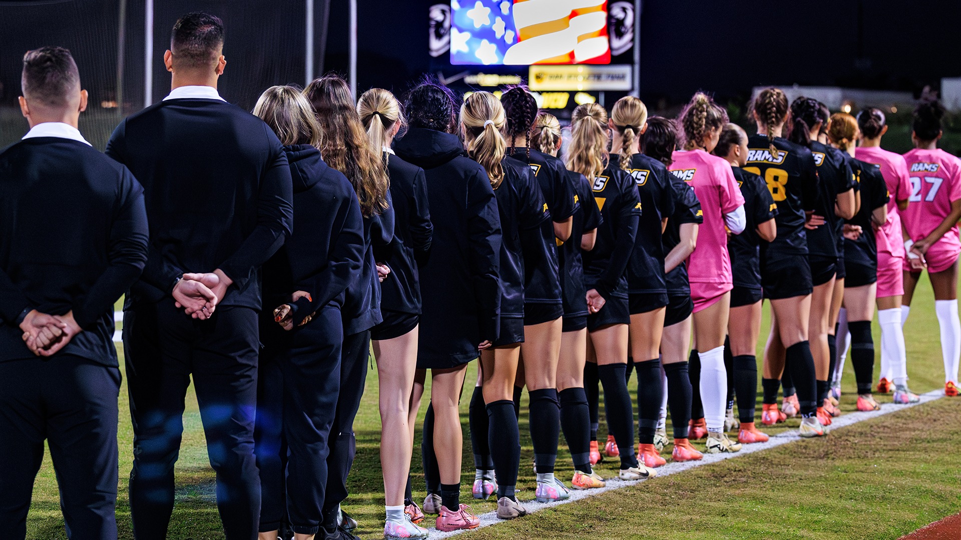 Women's Soccer Team Standing for National Anthem