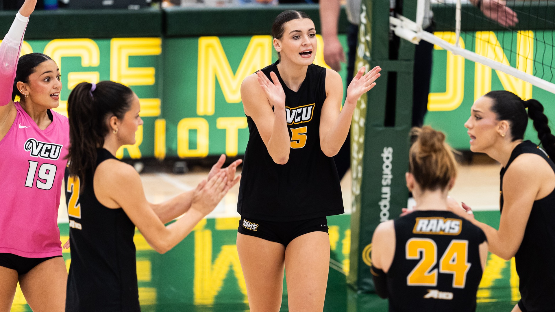 Molly McCall celebrates at George Mason