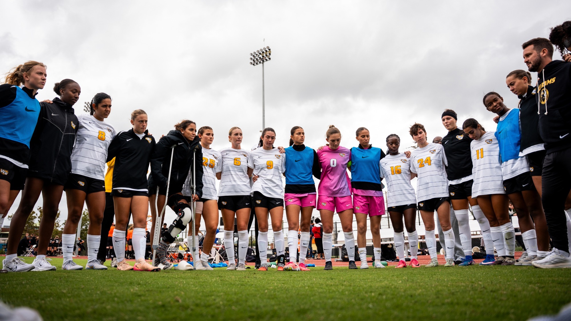 Women's Soccer huddle after victory against St. Bonaventure