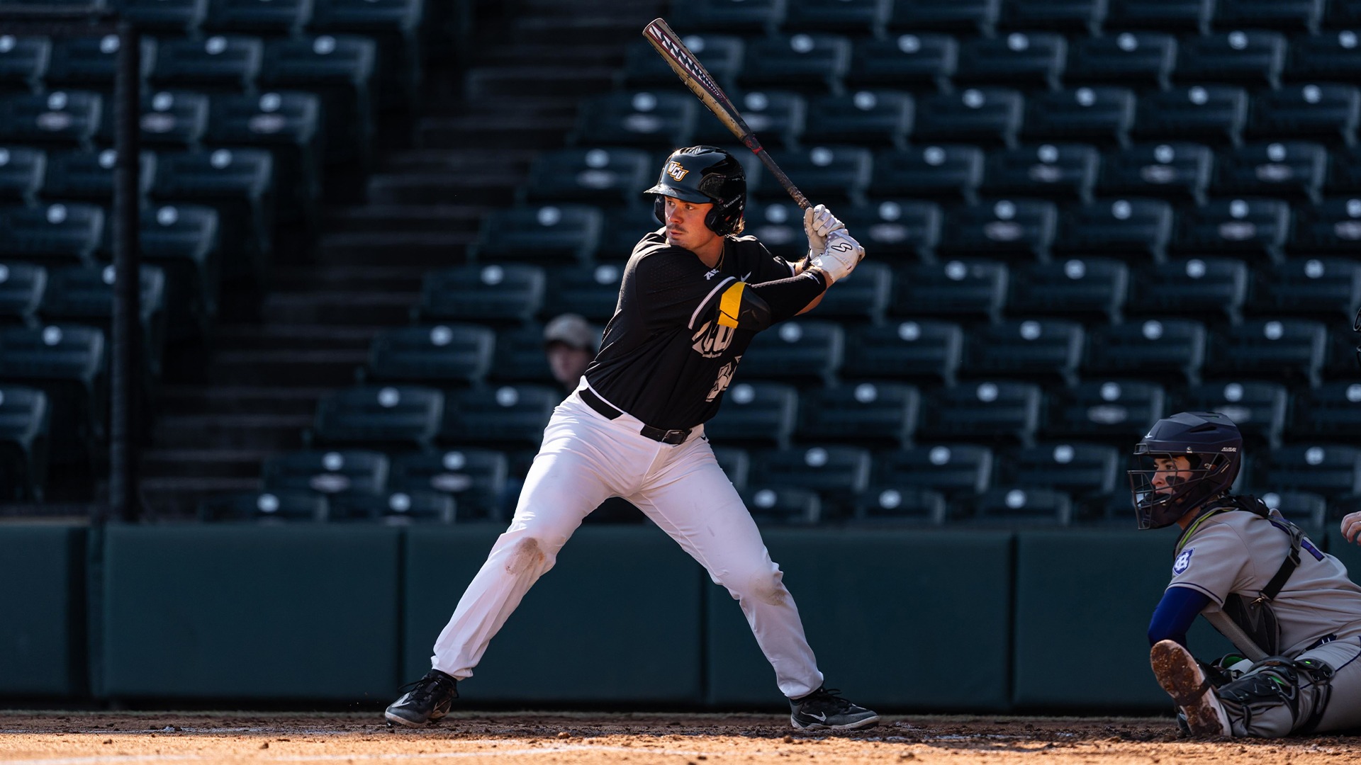 Quinn Maher bats vs. Holy Cross in final Opening Day at The Diamond
