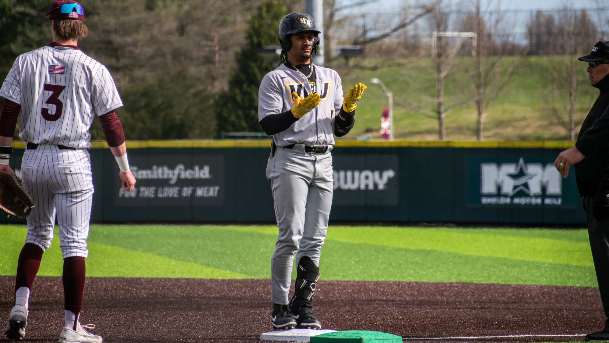 Michael Petite celebrates a single at Virginia Tech