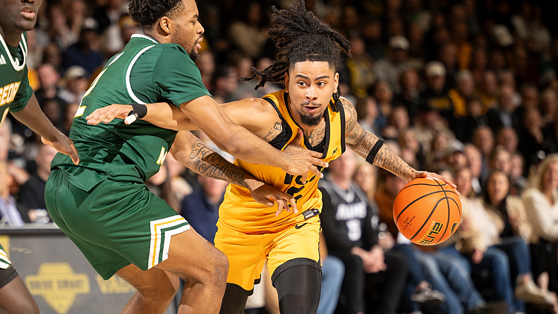 Terrence Hill Jr. drives against George Mason