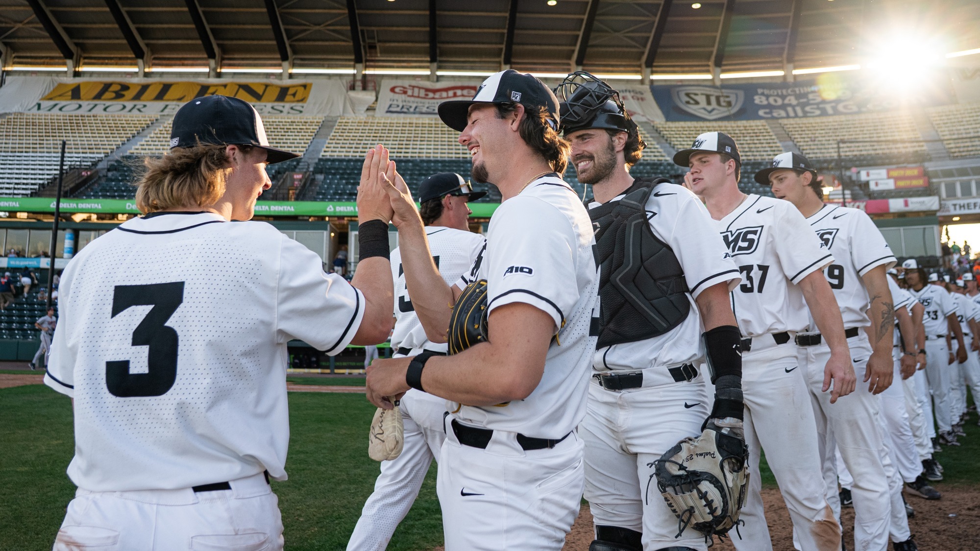 Rams High Five After Win Over #9 Virginia