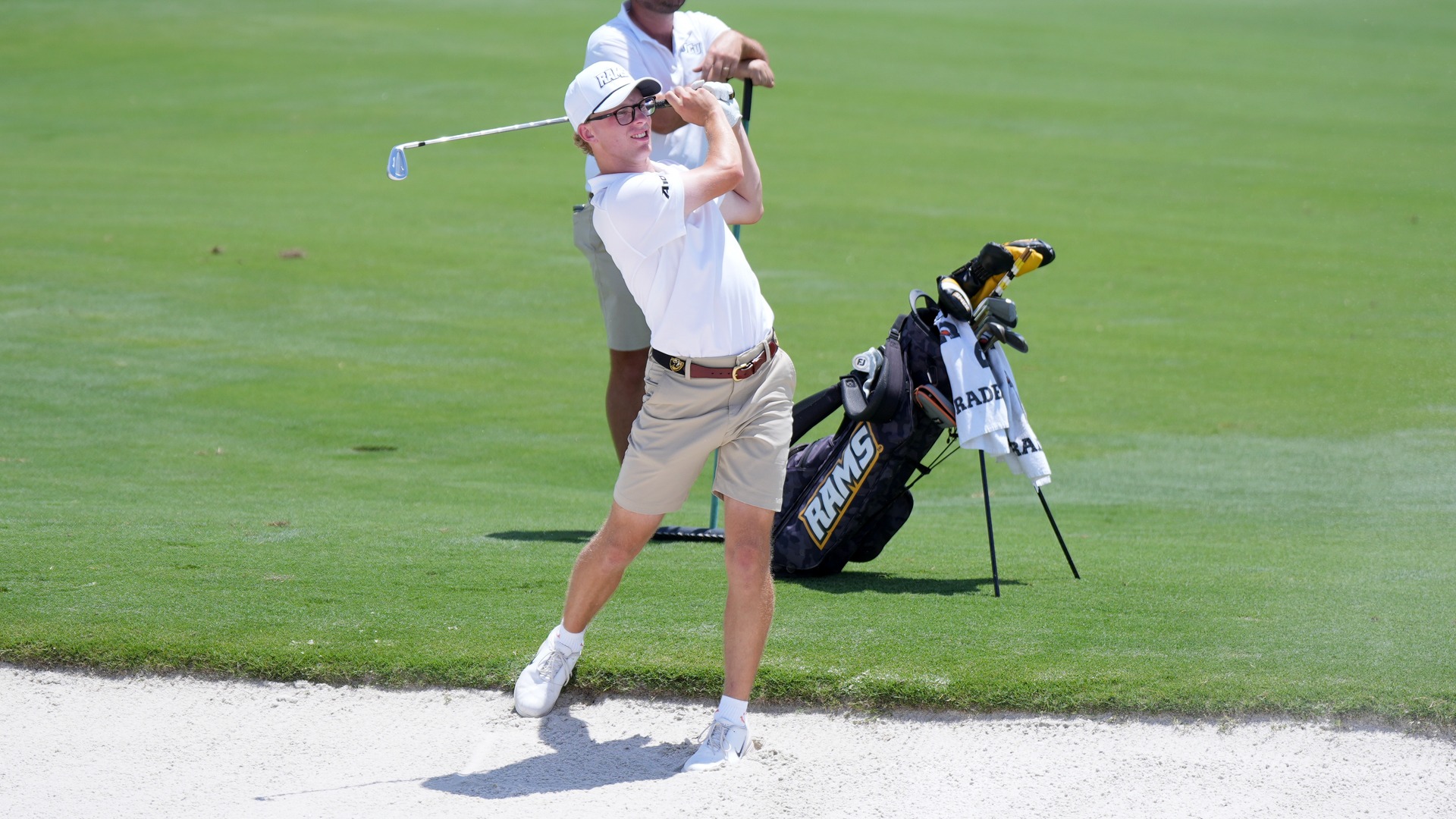 Braden O'Grady hits out of sand trap