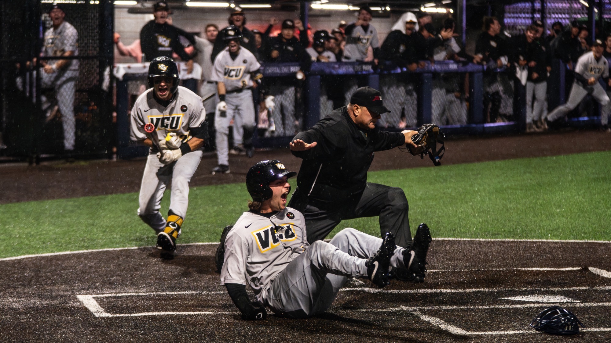 Nick Flores celebrates winning run in A-10 Championship Final Game One