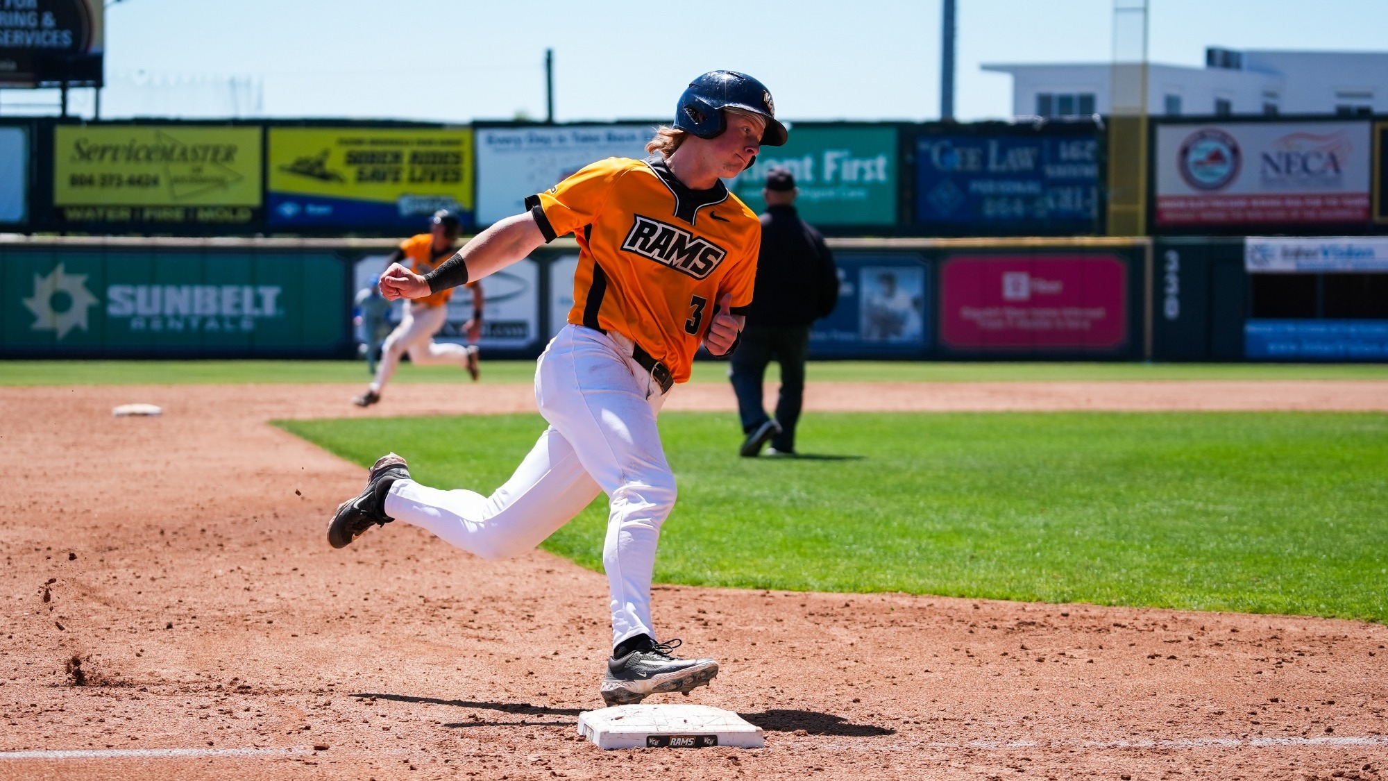 Nate Kirkpatrick rounds third base vs. Saint Louis