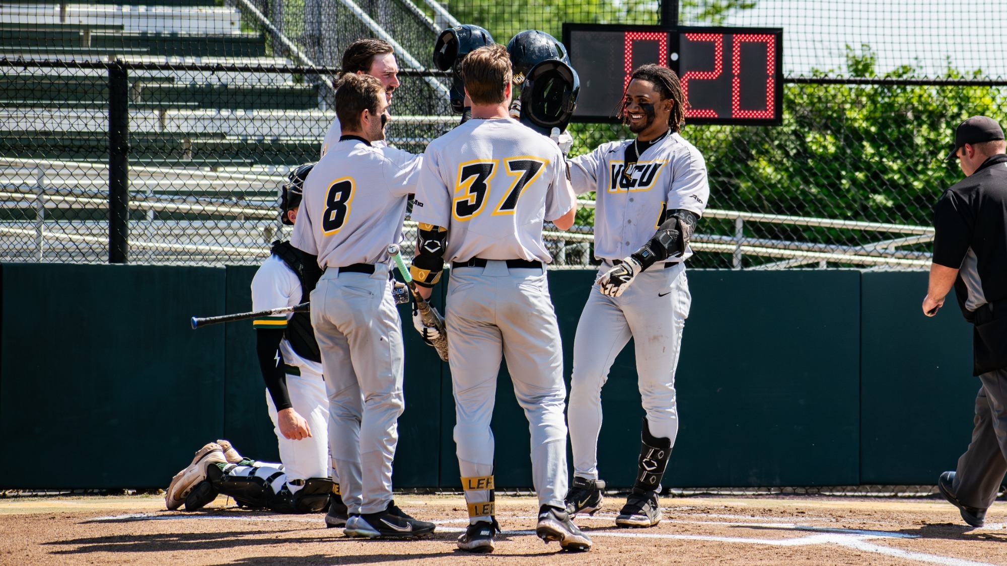 Michael Petite helmet taps after 12th home run