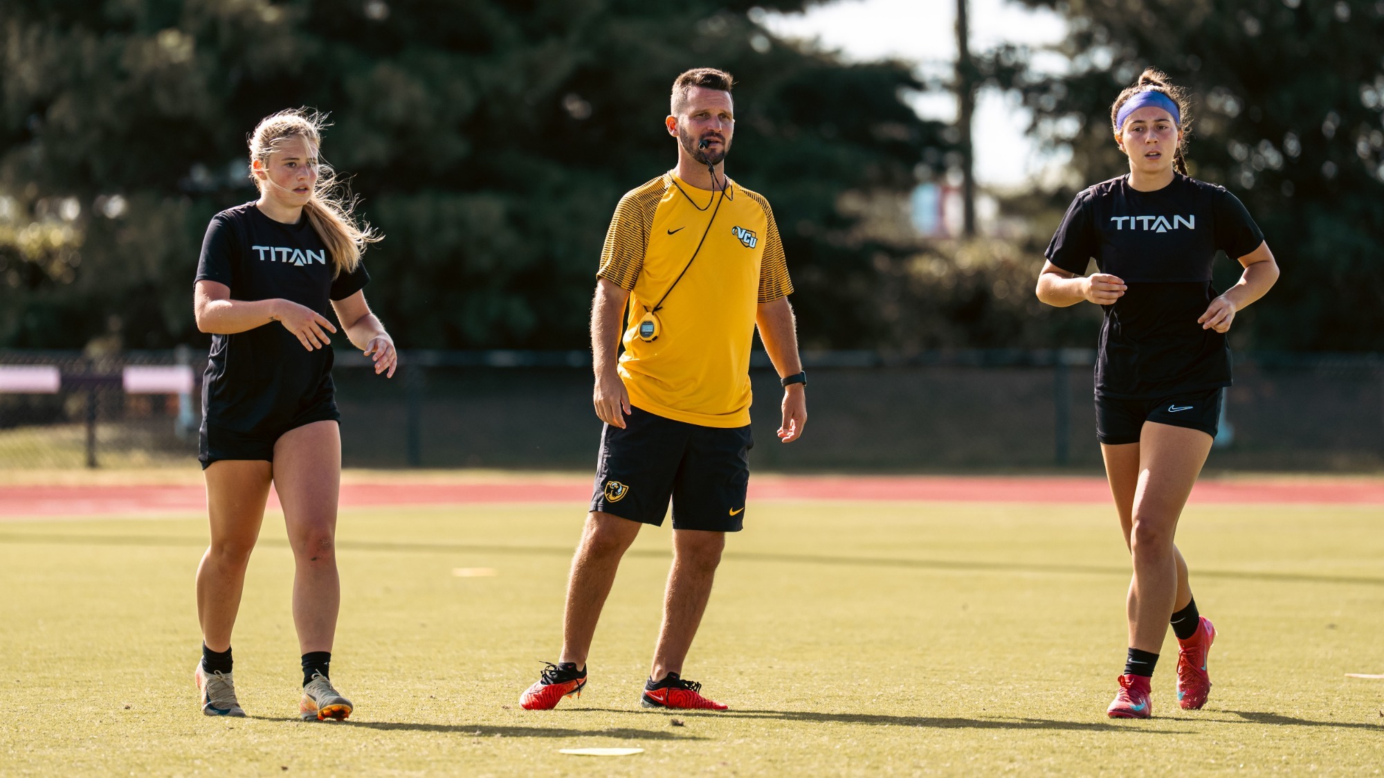 Matt Freibaum coaches at practice