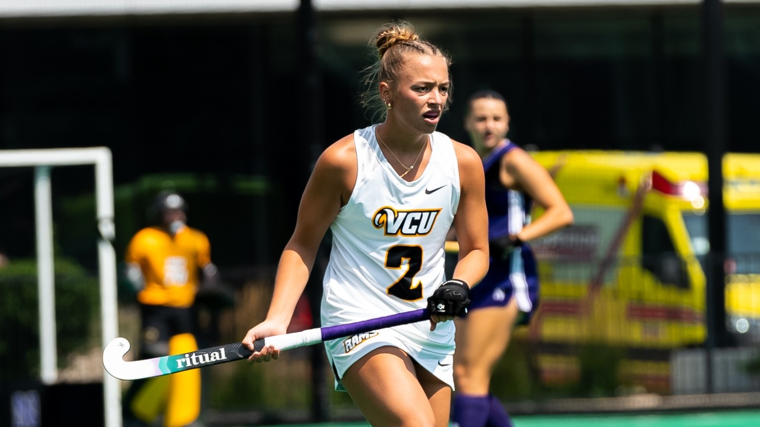 Callie Dieffenbacher of VCU wearing a white #2 jersey stands ready in a game at Northwestern 